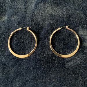Rose-gold colored hoop earrings
